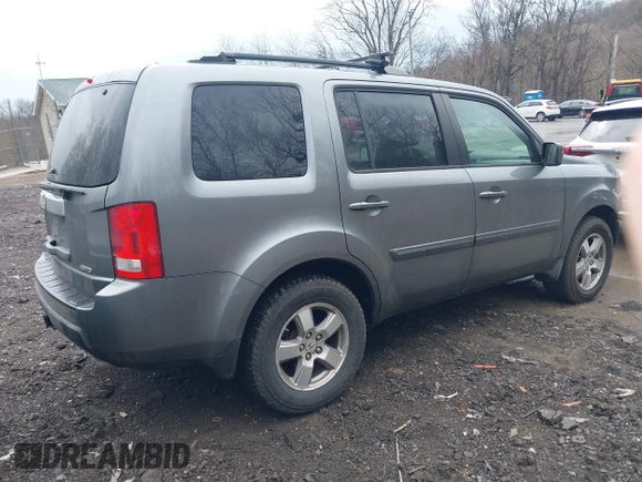 2009 Honda Pilot EX-L with VIN 5FNYF48669B033858, listed as a IAAI auction lot 41918525 with 161,605 mi miles and . Bid and sale history available at carsss.com. Image 4.