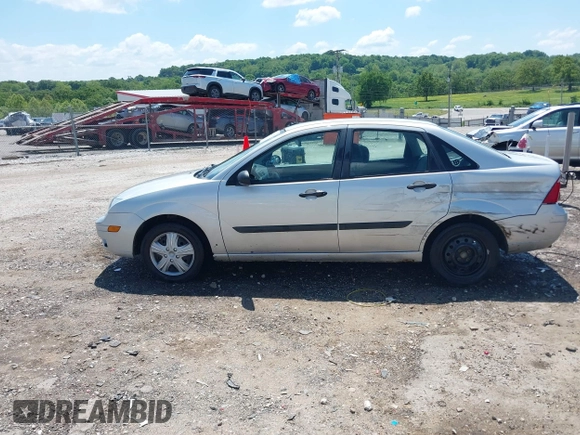 2007 Ford Focus S z VIN 1FAFP34N57W109953, wystawiony jako IAAI lot #42225399 z przebiegiem Nie podano mil oraz . Historia ofert i sprzedaży dostępna na DreamBid. Obrazek 14.