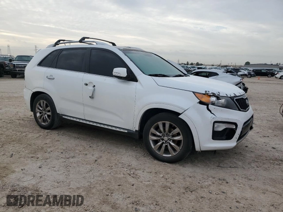 2012 Kia Sorento SX with VIN 5XYKW4A21CG303835, listed as a Copart auction lot 48239835 with 335,934 mi miles and Salvage Title. Bid and sale history available at carsss.com. Image 4.