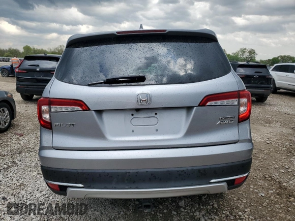 2022 Honda Pilot Touring 7-Passenger with VIN 5FNYF6H69NB019572, listed as a Copart auction lot 55446895 with 82,424 mi miles and Salvage title. Bid and sale history available at DreamBid. Image 6.