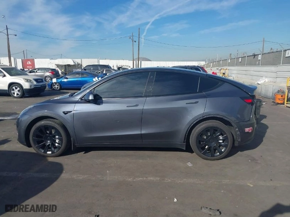 2021 Tesla Model Y Long Range with VIN 5YJYGDEE7MF149037, listed as a IAAI auction lot 41252869 with NaN miles. Bid and sale history available at carsss.com. Image 14.
