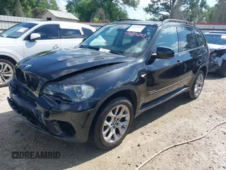 2011 BMW X5 35i z VIN 5UXZV4C56BL410499, wystawiony jako IAAI lot #42117697 z przebiegiem 158 233 mil mil oraz . Historia ofert i sprzedaży dostępna na DreamBid. Obrazek 2.