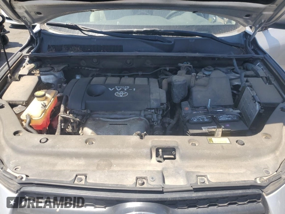 2010 Toyota RAV4 z VIN 2T3ZF4DV0AW050199, wystawiony jako Copart lot #63526535 z przebiegiem 127 022 mil mil oraz Szkoda całkowita • Salvage title. Historia ofert i sprzedaży dostępna na DreamBid. Obrazek 12.