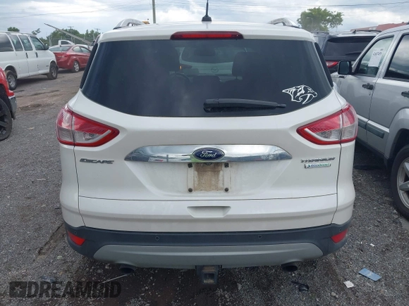 2015 Ford Escape Titanium with VIN 1FMCU0J99FUB92563, listed as a IAAI auction lot 42649556 with 183,199 mi miles and . Bid and sale history available at DreamBid. Image 16.