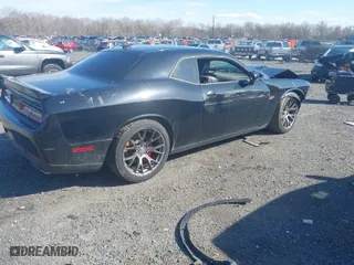 2015 Dodge Challenger SRT 392 with VIN 2C3CDZDJ5FH904816, listed as a IAAI auction lot 41881898 with 100,247 mi miles. Bid and sale history available at carsss.com. Image 4.