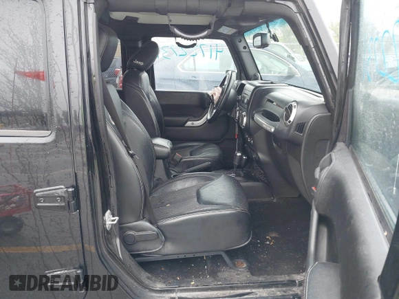 2013 Jeep Wrangler Unlimited Sport z VIN 1C4BJWDGXDL596450, wystawiony jako IAAI lot #42323862 z przebiegiem 114 105 mil mil oraz . Historia ofert i sprzedaży dostępna na DreamBid. Obrazek 5.