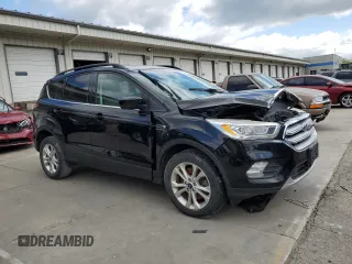 2017 Ford Escape SE z VIN 1FMCU0G93HUF10560, wystawiony jako Copart lot #57973915 z przebiegiem 127 444 mil mil oraz Czysty tytuł • Clean title. Historia ofert i sprzedaży dostępna na DreamBid. Obrazek 4.