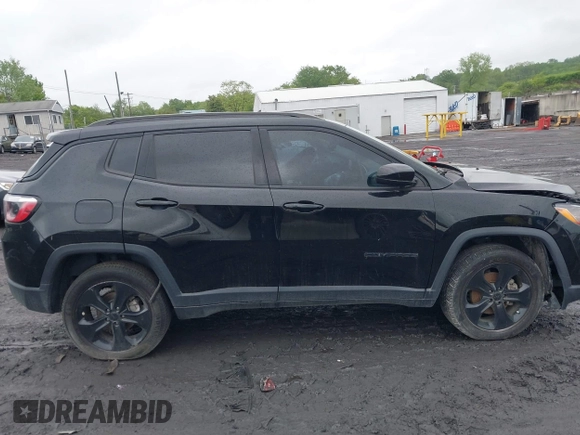2021 Jeep Compass Latitude with VIN 3C4NJDBB6MT590092, listed as a IAAI auction lot 42351097 with 72,428 mi miles and . Bid and sale history available at DreamBid. Image 13.