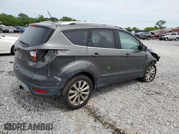 2018 Ford Escape Titanium with VIN 1FMCU9J97JUB34691, listed as a Copart auction lot 56404625 with 107,037 mi miles and Salvage title. Bid and sale history available at DreamBid. Image 3.