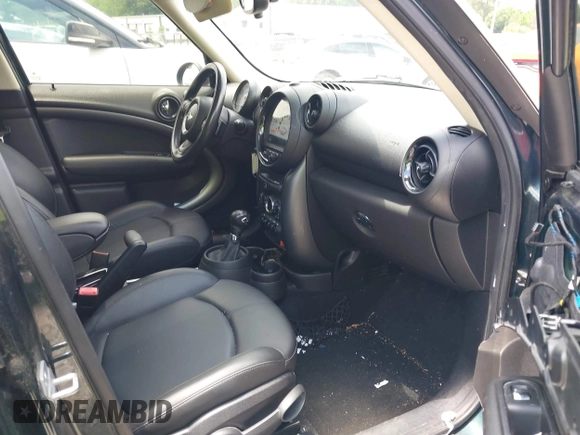 2013 MINI Countryman S z VIN WMWZC3C52DWP20729, wystawiony jako IAAI lot #42388184 z przebiegiem 165 283 mil mil oraz . Historia ofert i sprzedaży dostępna na DreamBid. Obrazek 5.