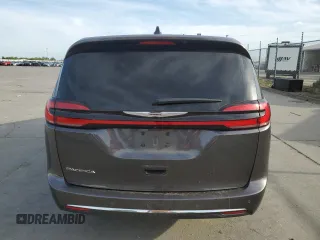 2023 Chrysler Pacifica Touring L z VIN 2C4RC1BG0PR514820, wystawiony jako Copart lot #52978115 z przebiegiem 87 980 mil mil oraz Szkoda całkowita • Salvage title. Historia ofert i sprzedaży dostępna na DreamBid. Obrazek 6.
