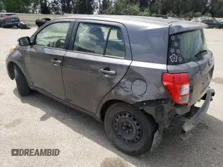 2014 Scion xD with VIN JTKKUPB41E1046114, listed as a Copart auction lot 54599235 with 125,979 mi miles and Salvage title. Bid and sale history available at DreamBid. Image 2.