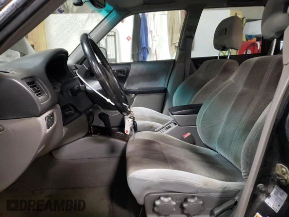 2002 Subaru Forester S w/Premium Pkg with VIN JF1SF656X2H718673, listed as a Copart auction lot 43409005 with 165,375 mi miles and Salvage Title. Bid and sale history available at carsss.com. Image 7.