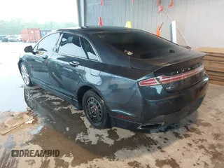 2014 Lincoln MKZ with VIN 3LN6L2J90ER812203, listed as a IAAI auction lot 42078804 with 139,238 mi miles. Bid and sale history available at carsss.com. Image 3.