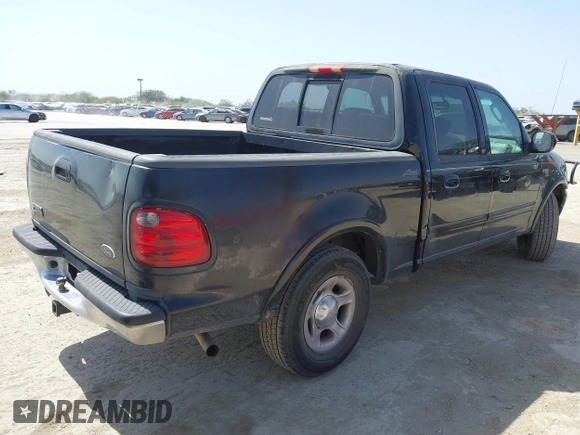 2003 Ford F-150 XLT with VIN 1FTRW07L53KC01651, listed as a IAAI auction lot 41827007 with 233,842 mi miles and . Bid and sale history available at DreamBid. Image 4.