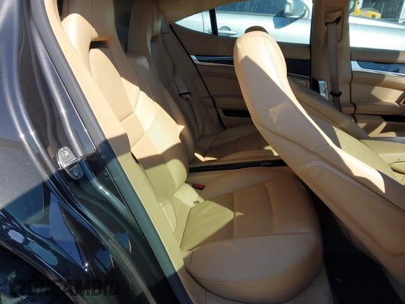2014 Porsche Panamera S E-Hybrid with VIN WP0AD2A76EL044591, listed as a IAAI auction lot 42436817 with 89,009 mi miles and . Bid and sale history available at DreamBid. Image 8.