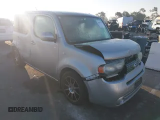 2011 Nissan Cube S z VIN JN8AZ2KR6BT205720, wystawiony jako IAAI lot #41647157 z przebiegiem 154 116 mil mil oraz . Historia ofert i sprzedaży dostępna na DreamBid. Obrazek 1.