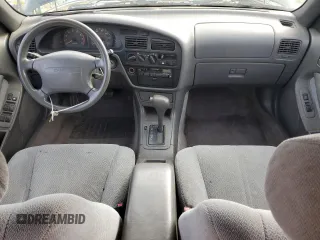 1995 Toyota Camry LE z VIN 4T1GK12W4SU079938, wystawiony jako Copart lot #77065084 z przebiegiem 222 731 mil mil oraz Szkoda całkowita • Salvage title. Historia ofert i sprzedaży dostępna na DreamBid. Obrazek 8.