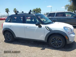 2014 MINI Countryman S z VIN WMWZC3C56EWP52407, wystawiony jako IAAI lot #42255716 z przebiegiem 74 943 mil mil oraz . Historia ofert i sprzedaży dostępna na DreamBid. Obrazek 13.