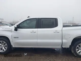 2019 Chevrolet Silverado 1500 LT with VIN 3GCUWCED5KG204899, listed as a IAAI auction lot 41435580 with 50,011 mi miles and . Bid and sale history available at DreamBid. Image 14.