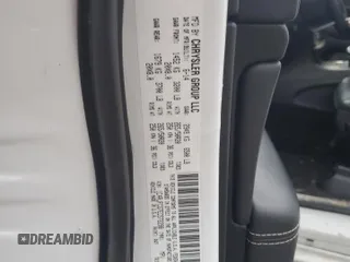 2014 Jeep Grand Cherokee Overland with VIN 1C4RJFCG7EC572298, listed as a Copart auction lot 83970004 with 104,861 mi miles and Salvage Title. Bid and sale history available at DreamBid. Image 14.