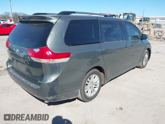 2013 Toyota Sienna XLE AAS with VIN 5TDYK3DCXDS379272, listed as a IAAI auction lot 41407282 with 240,491 mi miles and . Bid and sale history available at carsss.com. Image 4.