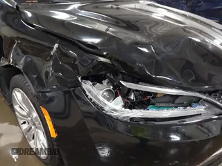 2015 Chrysler 200 Limited with VIN 1C3CCCAB9FN690174, listed as a IAAI auction lot 41330163 with 123,633 mi miles and . Bid and sale history available at carsss.com. Image 6.