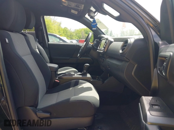 2021 Toyota Tacoma SR with VIN 3TMCZ5AN0MM417261, listed as a IAAI auction lot 42240693 with 38,625 mi miles and . Bid and sale history available at DreamBid. Image 5.