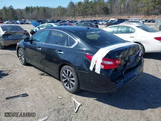 2017 Nissan Altima 2.5 SR with VIN 1N4AL3AP4HC290929, listed as a IAAI auction lot 41573036 with 77,029 mi miles. Bid and sale history available at carsss.com. Image 3.