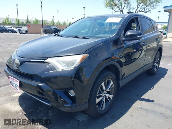 2018 Toyota RAV4 XLE z VIN 2T3WFREV1JW450514, wystawiony jako IAAI lot #42291018 z przebiegiem 89 370 mil mil oraz . Historia ofert i sprzedaży dostępna na DreamBid. Obrazek 18.