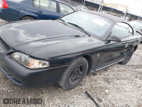 1997 Ford Mustang with VIN 1FALP4041VF129619, listed as a IAAI auction lot 41440766 with 135,934 mi miles. Bid and sale history available at carsss.com. Image 2.