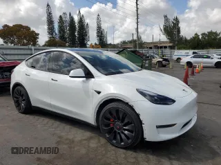 2022 Tesla Model Y Performance with VIN 7SAYGDEFXNF510418, listed as a Copart auction lot 51131465 with 16,263 mi miles and Salvage Title. Bid and sale history available at DreamBid. Image 4.