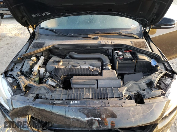 2015 Volvo V60 z VIN YV1612SD6F1213017, wystawiony jako Copart lot #78162364 z przebiegiem 140 942 mil mil oraz Szkoda całkowita • Salvage title. Historia ofert i sprzedaży dostępna na DreamBid. Obrazek 12.