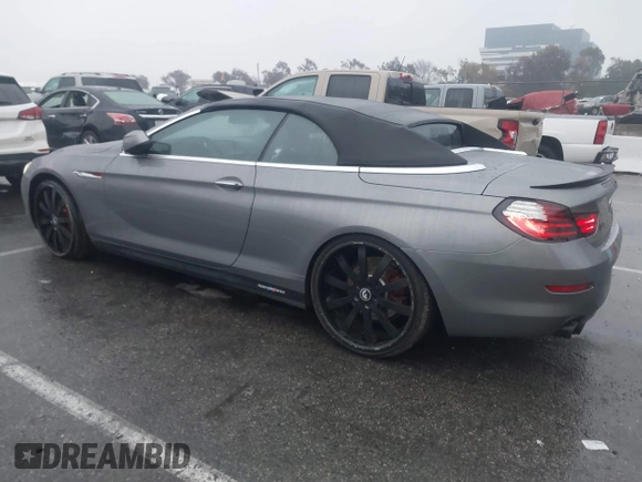 2012 BMW 6 Series 650i with VIN WBALZ3C5XCDL70748, listed as a IAAI auction lot 41502640 with 102,519 mi miles. Bid and sale history available at carsss.com. Image 14.