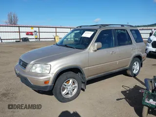 2001 Honda CR-V SE with VIN JHLRD18731C054625, listed as a IAAI auction lot 41970357 with 176,227 mi miles. Bid and sale history available at carsss.com. Image 2.