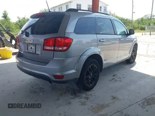 2019 Dodge Journey SE with VIN 3C4PDCBB0KT848601, listed as a IAAI auction lot 41991558 with 76,272 mi miles and . Bid and sale history available at DreamBid. Image 4.