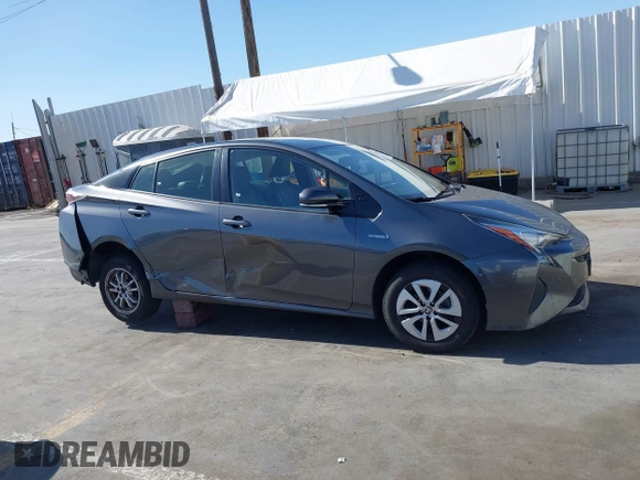 2017 Toyota Prius Two with VIN JTDKARFU4H3036689, listed as a IAAI auction lot 42265196 with 110,310 mi miles and . Bid and sale history available at DreamBid. Image 13.