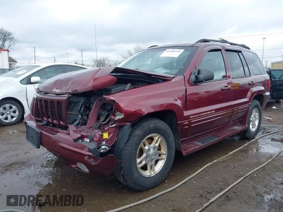 1999 Jeep Grand Cherokee Limited with VIN 1J4GW68N5XC642670, listed as a IAAI auction lot 41990199 with 154,492 mi miles. Bid and sale history available at carsss.com. Image 18.
