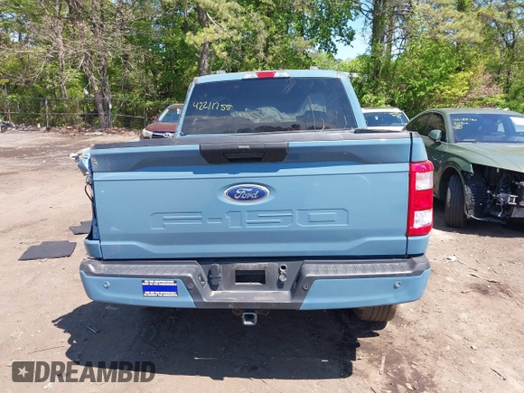 2023 Ford F-150 XL with VIN 1FTFW1E53PKD99214, listed as a IAAI auction lot 42211755 with 31 mi miles and . Bid and sale history available at DreamBid. Image 16.