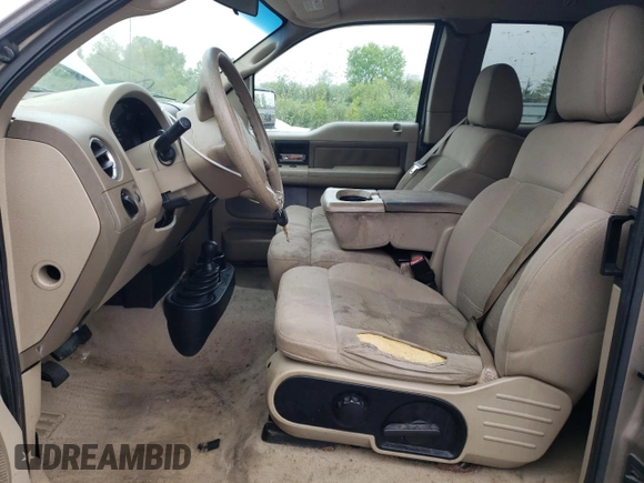 2004 Ford F-150 STX with VIN 1FTRX14W44NC37543, listed as a Copart auction lot 57442095 with 201,071 mi miles and Salvage title. Bid and sale history available at DreamBid. Image 7.