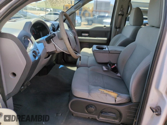 2007 Ford F-150 XLT with VIN 1FTRW12W37KD07142, listed as a Copart auction lot 61677585 with 193,758 mi miles and Clean title. Bid and sale history available at DreamBid. Image 7.