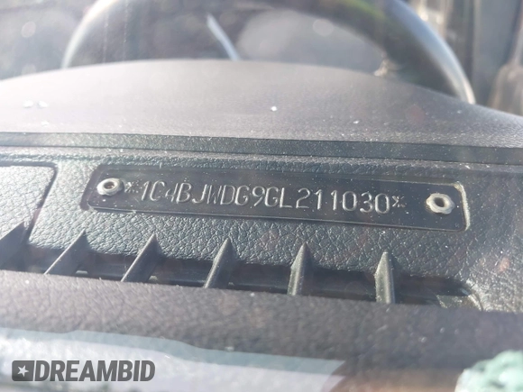 2016 Jeep Wrangler Unlimited Sport with VIN 1C4BJWDG9GL211030, listed as a IAAI auction lot 42459945 with 61,671 mi miles and . Bid and sale history available at DreamBid. Image 9.