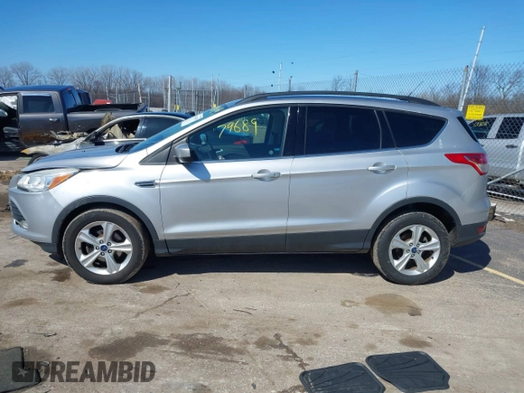 2014 Ford Escape SE with VIN 1FMCU0GX6EUE34729, listed as a IAAI auction lot 41879689 with 167,600 mi miles and . Bid and sale history available at DreamBid. Image 14.