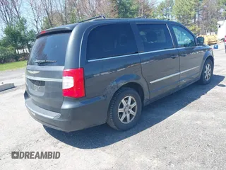 2012 Chrysler Town & Country Touring with VIN 2C4RC1BG4CR189809, listed as a IAAI auction lot 42093962 with 180,324 mi miles. Bid and sale history available at carsss.com. Image 4.