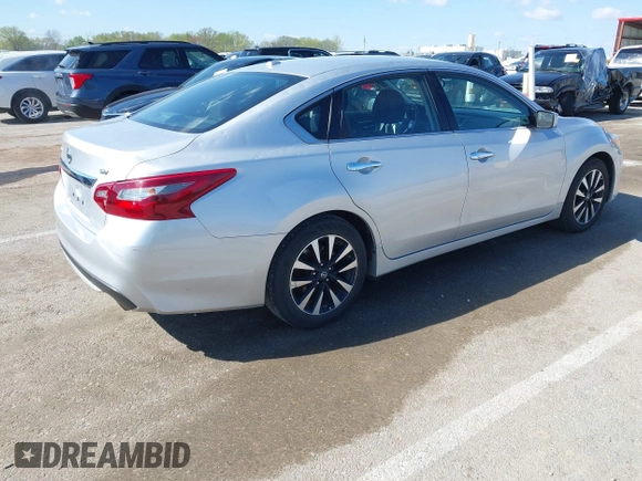 2018 Nissan Altima SR with VIN 1N4AL3APXJC258864, listed as a IAAI auction lot 42018305 with 59,265 mi miles and . Bid and sale history available at carsss.com. Image 4.