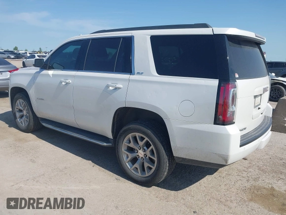 2017 GMC Yukon SLT z VIN 1GKS1BKC2HR378437, wystawiony jako IAAI lot #41923260 z przebiegiem 127 356 mil mil oraz . Historia ofert i sprzedaży dostępna na DreamBid. Obrazek 3.