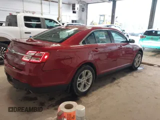 2015 Ford Taurus SEL with VIN 1FAHP2E82FG124009, listed as a IAAI auction lot 42323744 with 159,196 mi miles and . Bid and sale history available at DreamBid. Image 4.