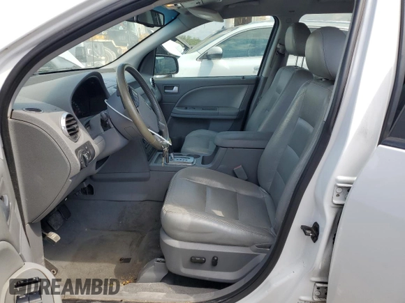 2006 Ford Freestyle SEL with VIN 1FMDK05126GA32604, listed as a Copart auction lot 63868405 with 220,530 mi miles and Salvage title. Bid and sale history available at DreamBid. Image 7.