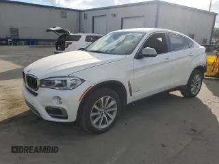 2018 BMW X6 xDrive35i with VIN 5UXKU2C52J0Z62235, listed as a Copart auction lot 76004803 with 72,379 mi miles. Bid and sale history available at carsss.com. Image 1.