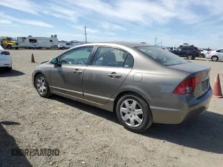2008 Honda Civic LX with VIN 2HGFA16518H318976, listed as a Copart auction lot 55897095 with 183,864 mi miles and Salvage Title. Bid and sale history available at DreamBid. Image 2.